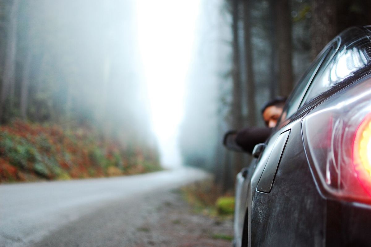 A quiet country road on a misty morning